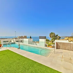 Apartment Oceanfront Duplex With A Rooftop Pool And Terrace, El Puerto de Santa Maria